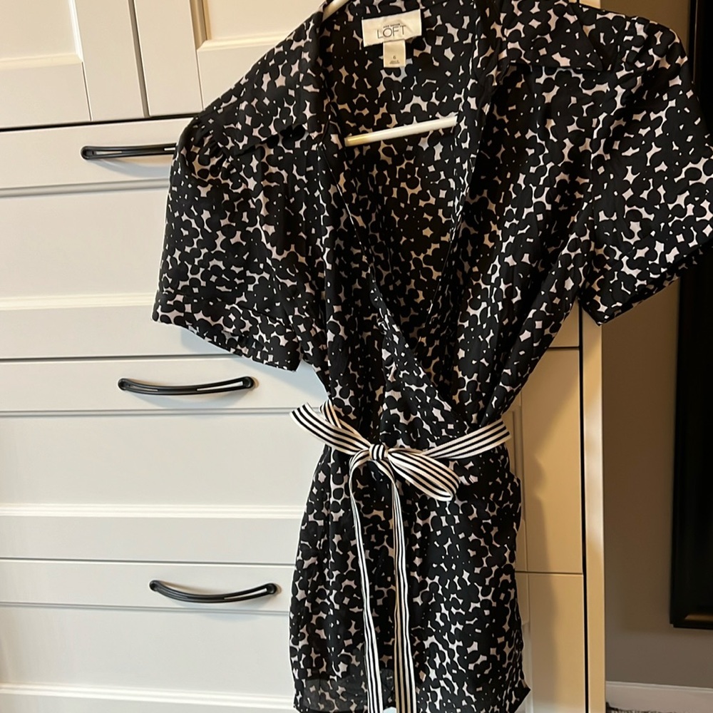 Ann Taylor loft size size 6 wrap blouse with black and white striped waist tie.